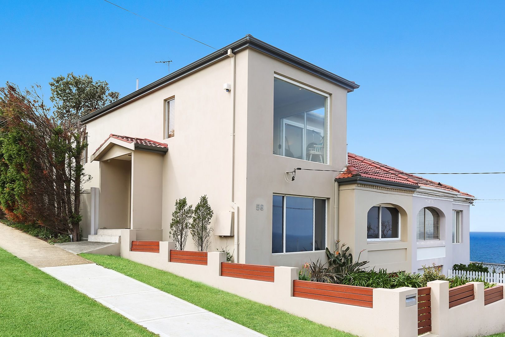 Rendered two-storey home with ocean views at Vaucluse